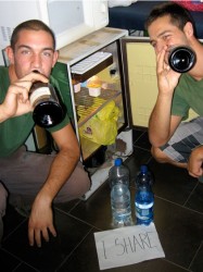 During a day of work, Alessandro and Matteo share some time at lunch to eat and drink together